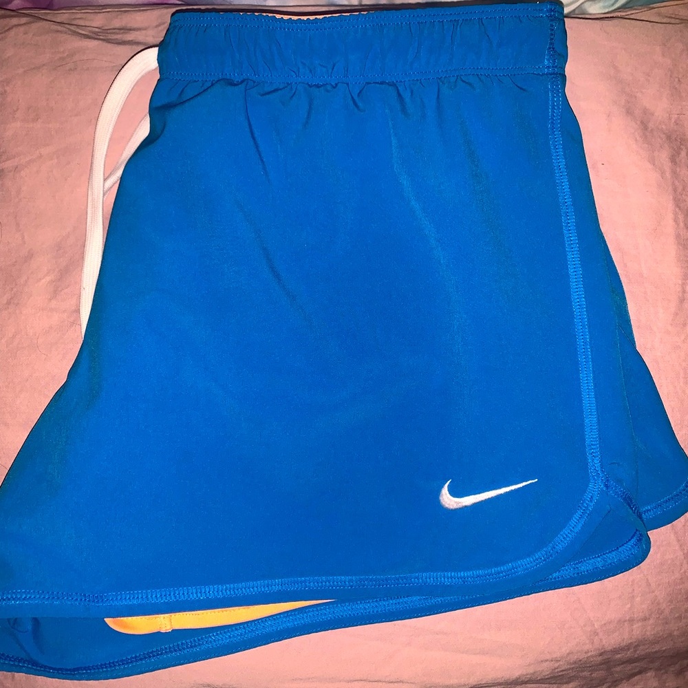 (3/$20) Womens size (large) Nike running shorts built in compression shorts